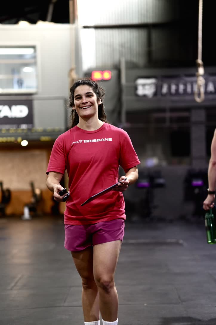 CrossFit Brisbane coach smiling on the gym floor